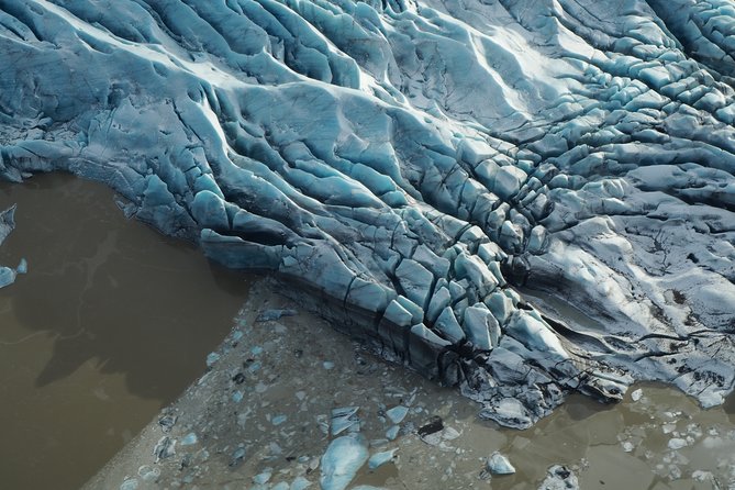 Airplane flight over glacier lagoons and Iceland's highest peak - Over Europe’s biggest glacier
