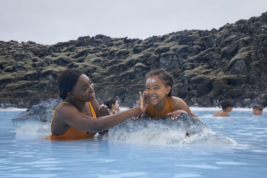 Blue Lagoon: Admission Package with Drink, Towel, and Mask - Entering the blue water