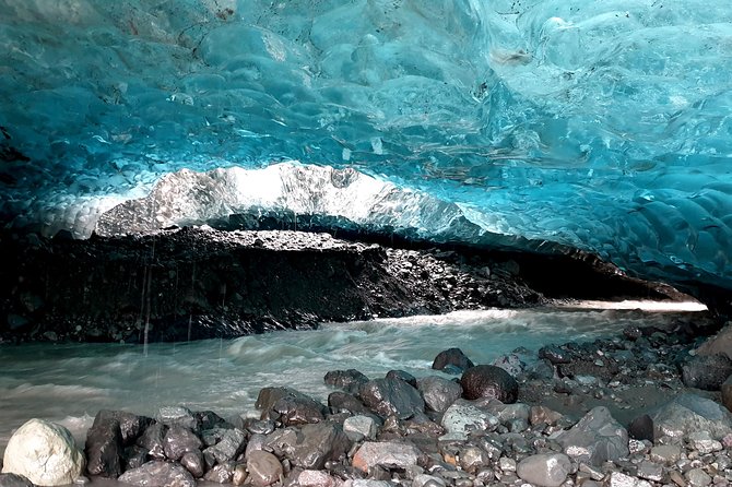 Crystal Ice Cave Adventure - Getting ready with helmet, crampons, and ice axe