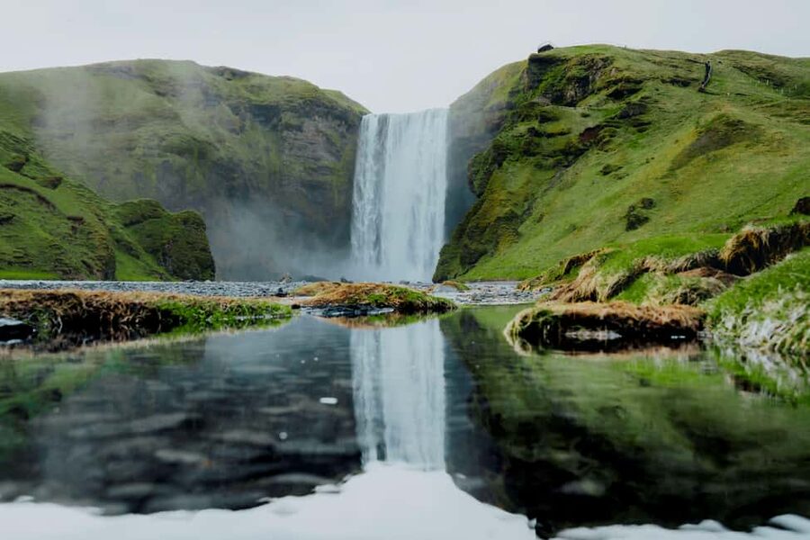 From Reykjavík: 2-Day South Coast Adventure - Day one begins with Reykjavík pickup and open-road views