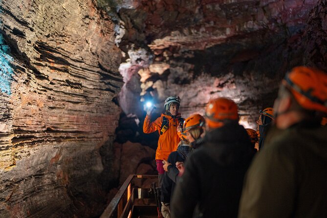 From Reykjavík: Evening Lava Tunnel Tour and Northern Lights Tour - Entering Raufarhólshellir after sunset