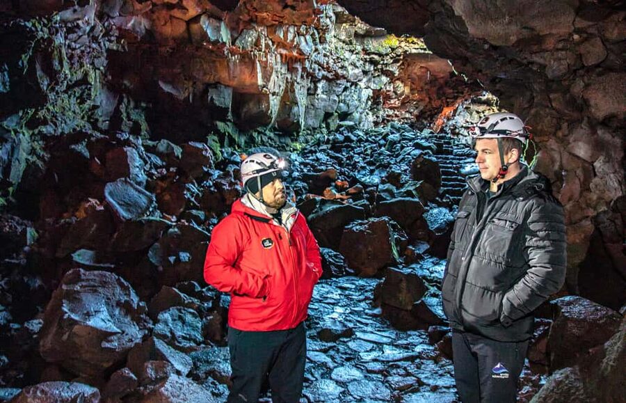From Reykjavik: Lava Caving Tour - Walking into the lava tunnel