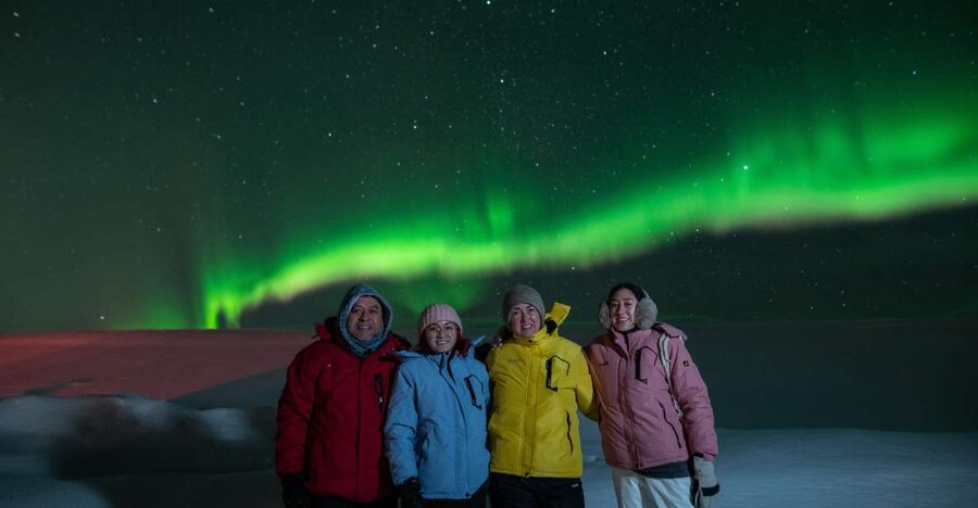 From Reykjavik: Northern Lights Guided Tour with Photos - Leaving Reykjavik behind the city lights