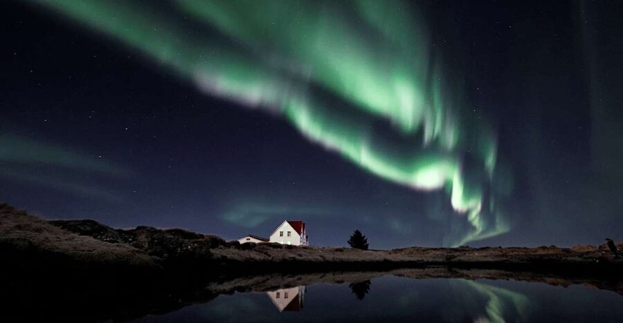 From Reykjavik: Northern Lights Tour with Hot Cocoa & Photos - The minibus makes the search more personal