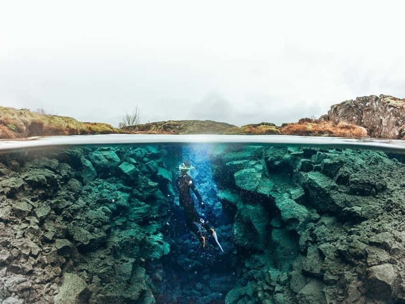 From Reykjavik: Silfra Snorkeling with Free Photos - Floating through the fissure