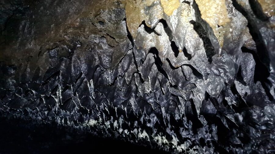 Geological Lava Tunnel Adventure - Arnarker Cave - Ice formations add another layer in winter