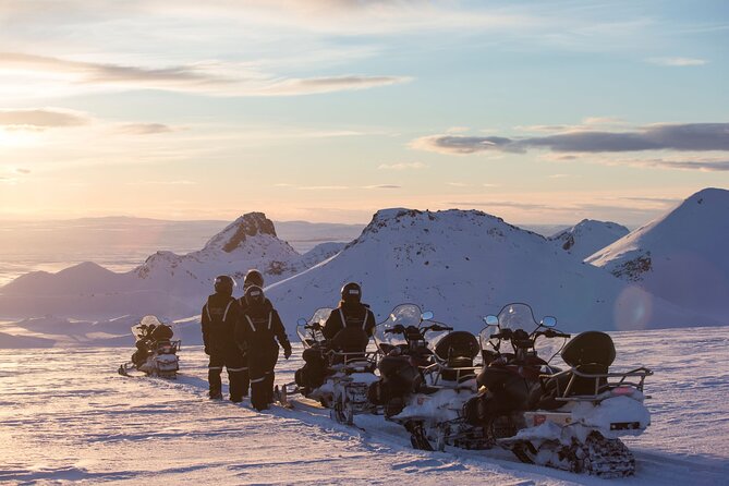 Golden Circle and Glacier Snowmobiling Day Trip from Reykjavik - Coach travel, pickup, and the pace of the day