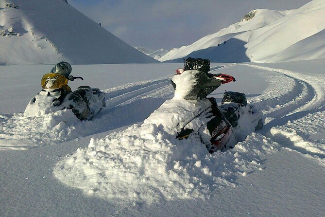 Golden Circle Super Jeep Adventure with Snowmobiling on Glacier - Pickup, group size, and the long day