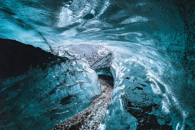 Ice Cave Tour from Vík - Walking across black ash and glacial ground
