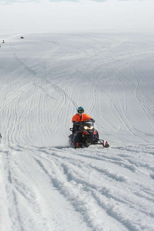 Into the Glacier: Snowmobile + Langjökull Ice Tunnel Combo - Riding a shared snowmobile across Langjökull