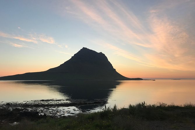 Midnight Sun Kayaking Adventure by Mt. Kirkjufell - Paddling across the bay beside Kirkjufell