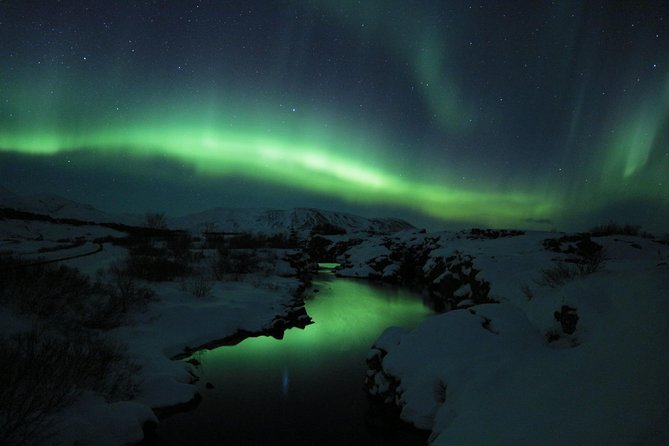 Northern Lights Midnight Adventure Small-Group from Reykjavík - How the guide searches for clearer skies