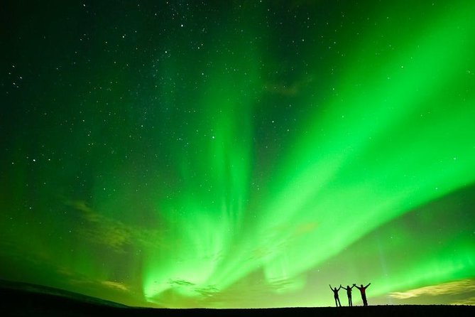 Northern Lights Minibus Tour with Hot Cocoa, Blankets & Photos - Leaving Reykjavik for a darker sky