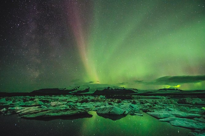 Northern Lights Small-Group Tour with Hot Chocolate & Photos - Chasing the forecast beyond the city