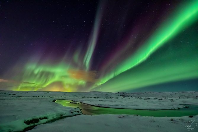 PRIVATE Northern light photo infused tour - Hot chocolate closes the night