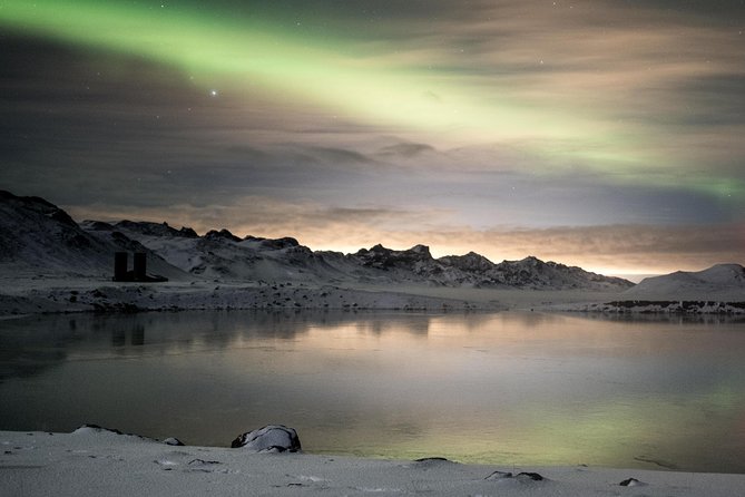 Private Northern lights with photographs - Searching for a clear patch of Icelandic sky