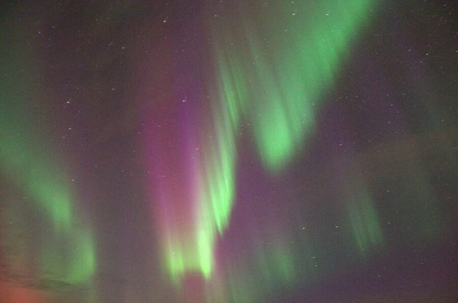 Reykjavík: New Year's Eve Northern Lights Yacht Cruise - Moving closer to shore for midnight