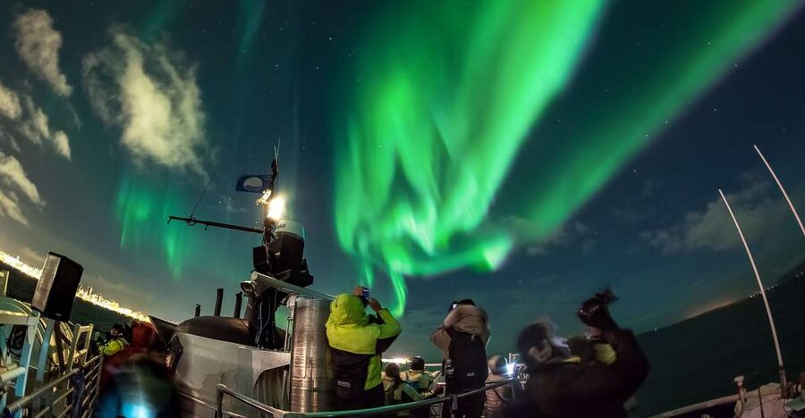 Reykjavik: Northern Lights Guided Boat Tour - Leaving Reykjavik Old Harbour After Dark