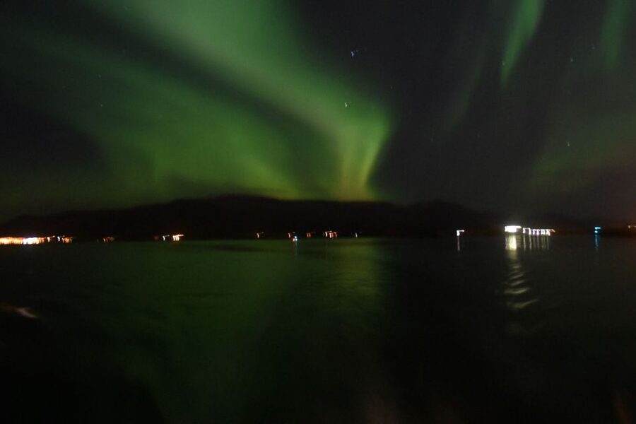 Reykjavik: Northern Lights Guided Boat Tour - Warm Overalls and the Reality of an Icelandic Night