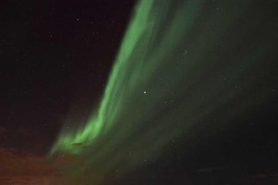 Reykjavik: Northern Lights Motor Yacht Cruise - Guide commentary and the human side of the trip