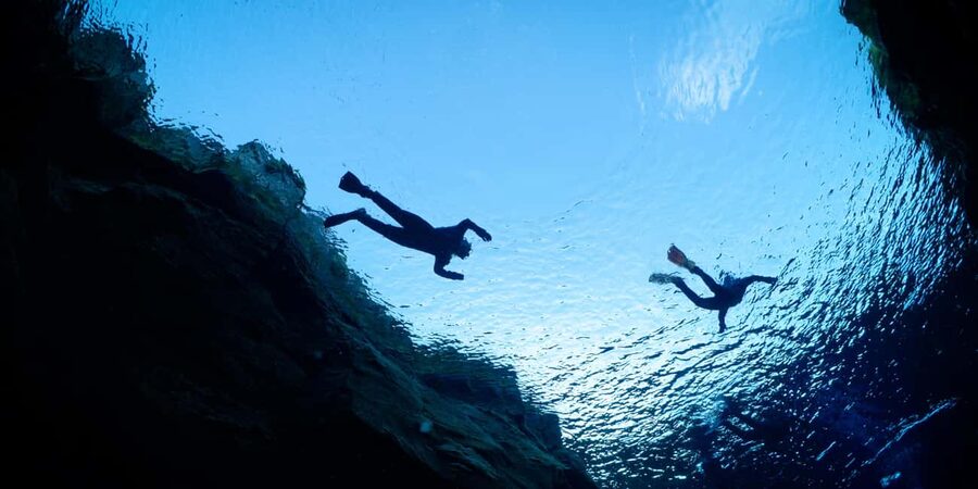 Reykjavík: Silfra Fissure Snorkeling and Lava Caving Tour - Two Icelandic worlds in one long day
