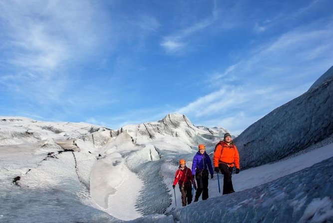 Reykjavik: South Coast, Waterfalls & Glacier Hike Small-Group - Seljalandsfoss and the slippery path behind the water