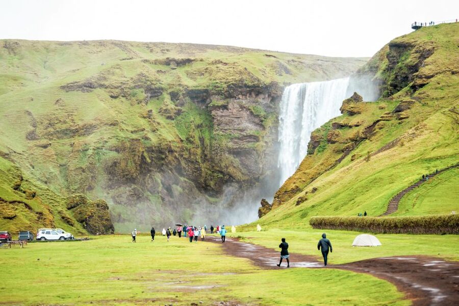 Reykjavik: South Coast Waterfalls & Glacier Small-Group Tour - Sólheimajökull gives you a close look at ice