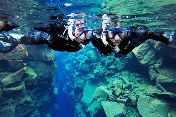 Silfra Drysuit Snorkeling Tour with Free Photos - From Reykjavik - The short walk out and hot chocolate