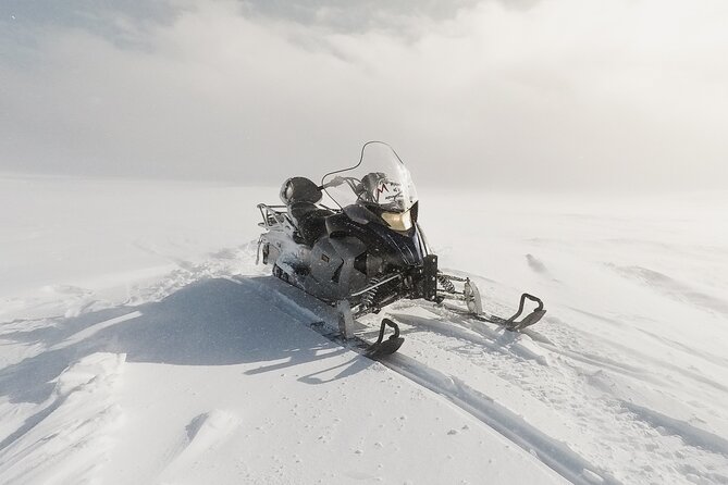 Snowmobiling on Langjokull Glacier and Secret Lagoon Tour - Riding a two-person snowmobile on the ice