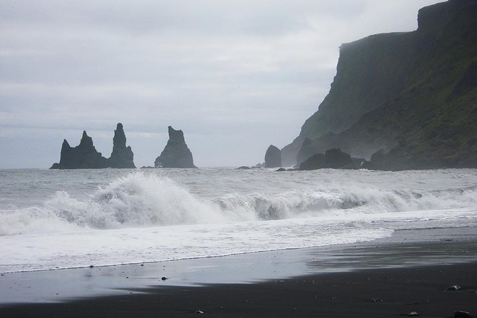 South Coast and Glacier Lagoon Day Trip by Super Jeep from Reykjavik - Dyrhólaey and Reynisfjara show Iceland’s dark coast