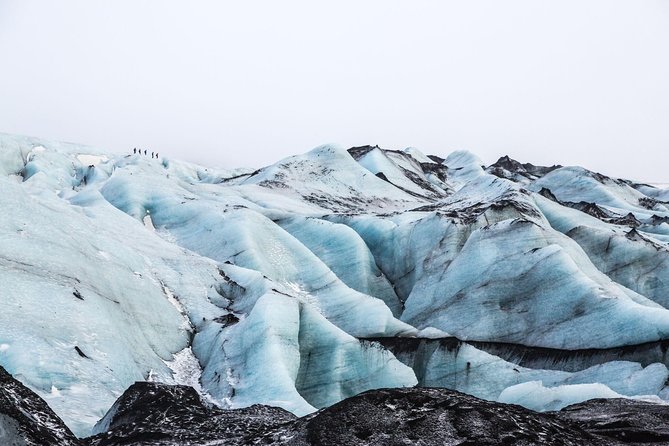 South Coast, Glacier Hike & Northern Lights from Reykjavik - Seljalandsfoss, where the water falls over the cliff