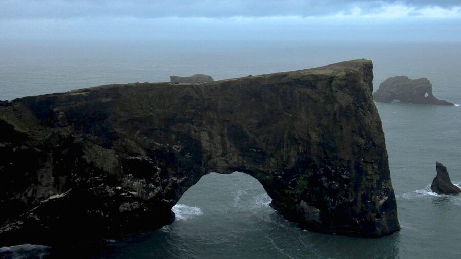 South Coast of Iceland. Black beach, glaсier, waterfalls... - Dyrhóley Frames the Volcanic Coast