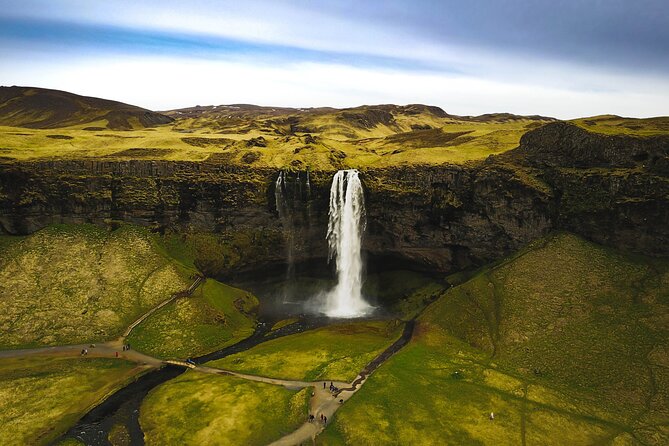 South Coast, Waterfalls and Black Sand Beach (Small Group Tour) - Sólheimajökull explains Iceland’s ice